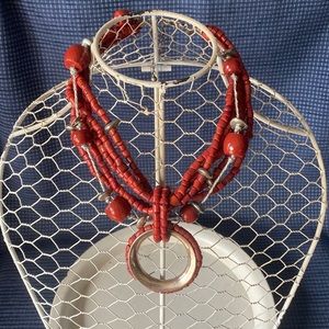 Chico’s 6-strand coral and silver bead necklace with circular pendant